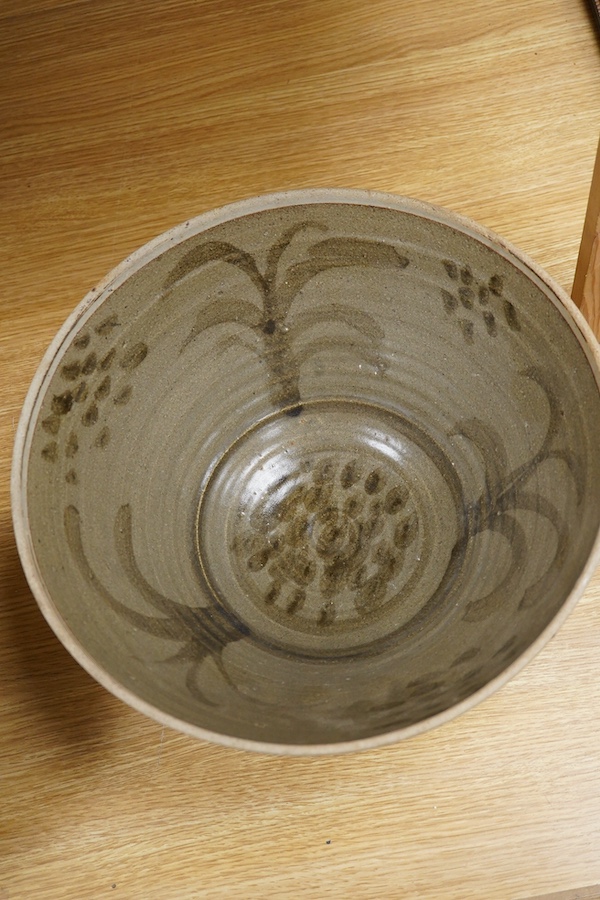 Three studio pottery bowls, one signed ‘A’ to the base, largest 34cm in diameter. Condition - good